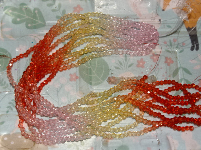 'Ombre Petal'  4 -4.5mm Glass Faceted (32 Facets)  Beads